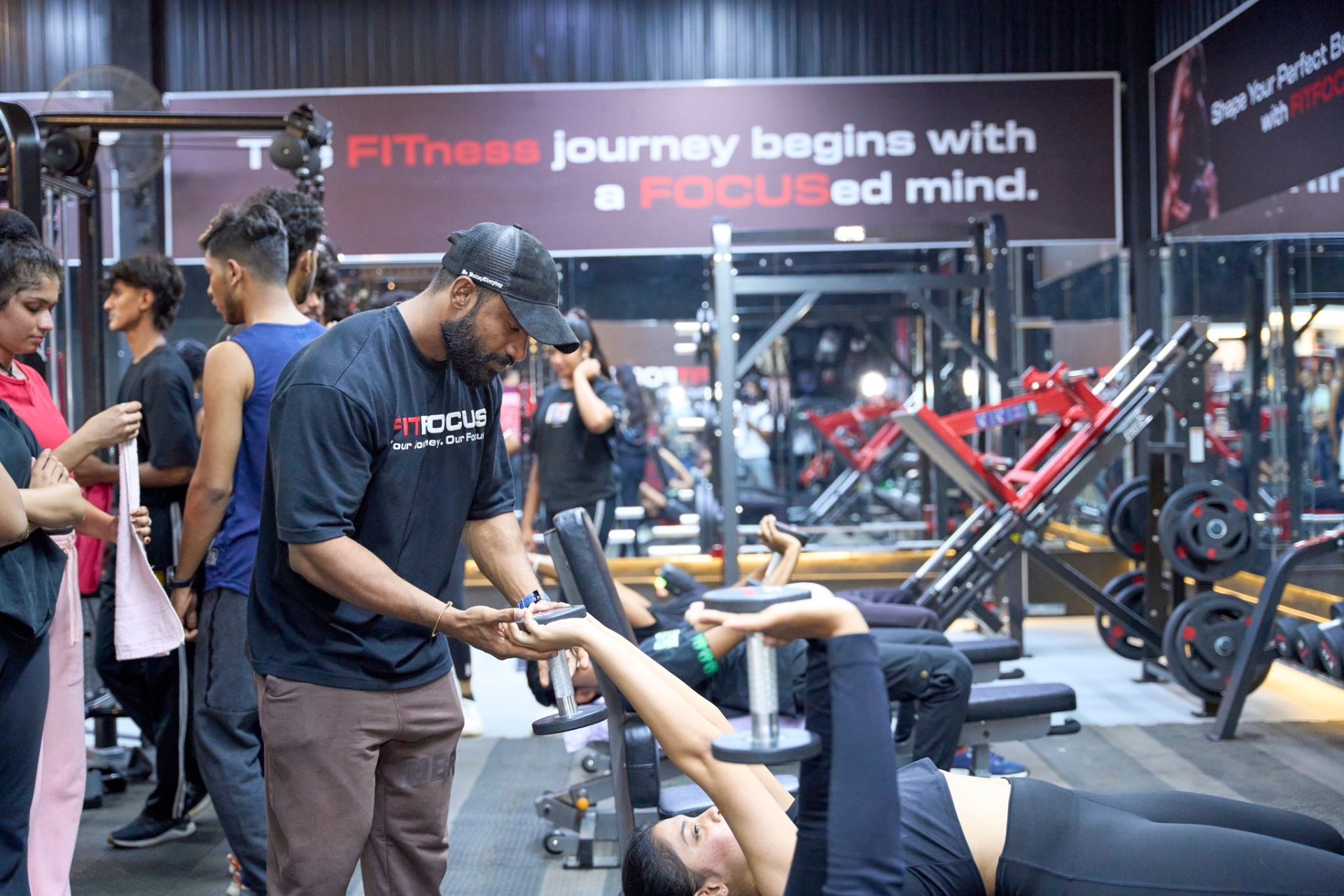 Trainer coaching members